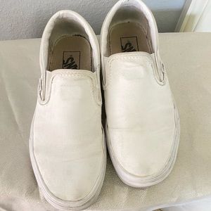 White slip ons from Vans